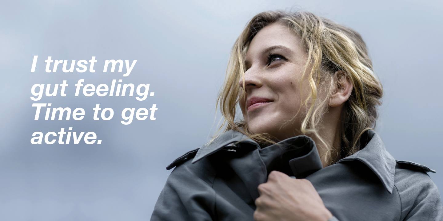 Orthomol Immun pro claim - Happy woman looks into the distance Orthomol Immun pro claim - Happy woman looks into the distance